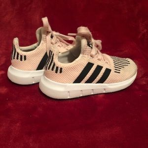 Light pink Adidas Swift shoes